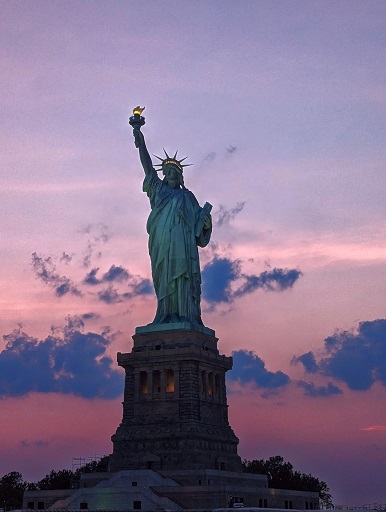 statue of liberty at sunset